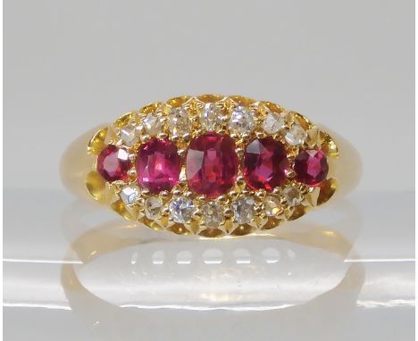 AN 18CT GOLD RUBY AND DIAMOND RING hallmarked Birmingham, 1910, finger size P1/2, weight 3.4gms Condition Report: Rubies;- i 