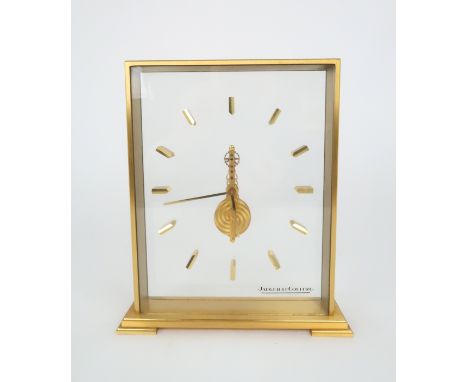 A JAEGER LE COULTRE CLOCK model 555, the floating 16 jewel movement with glass front dial with baton markers and Perspex back