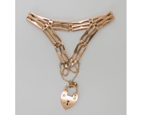 A 9CT GOLD FANCY LINK GATE BRACELET with a heart shaped clasp, stamped 9c, length approx 20cm, weight 14.9gms Condition Repor