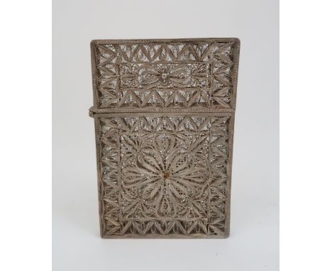 A CHINESE SILVER FILIGREE CARD CASE decorated with scrolling bands set with a shield cartouche, 9.7cm high, 50 grams Conditio