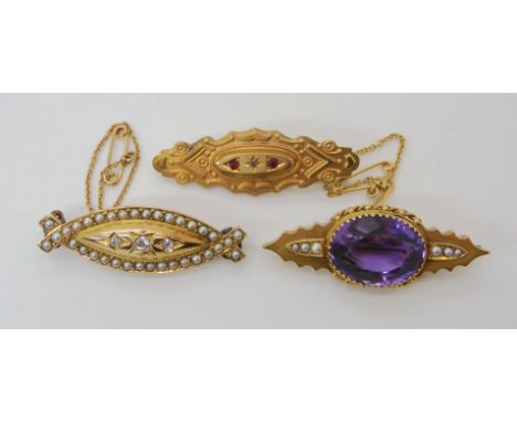 THREE VICTORIAN BROOCHES A bright yellow metal brooch set with three old cut diamonds of estimated approx 0.10cts in total, a