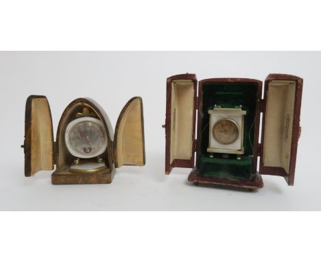 A BREVET FRENCH MOTHER OF PEARL MINIATURE CLOCK with gilded face aNd Arabic numerals with etched mark and 33817 to base, in f