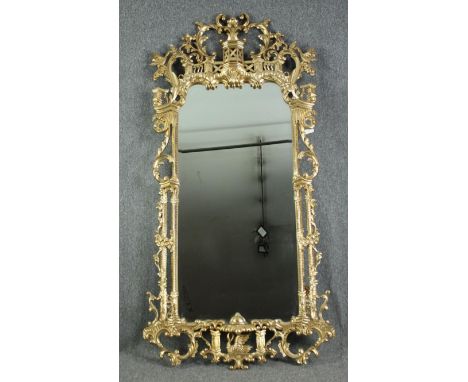 Pier mirror, full height carved giltwood in the Chinese Chippendale style. H.200 W.100cm.