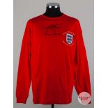Red replica England 50th Anniversary autographed shirt.