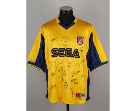 Yellow Arsenal autographed replica short-sleeved shirt, 1999-2001, bearing approximately nineteen player autographs&nbsp;