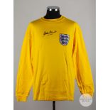 A replica yellow Gordon Banks autographed England shirt.
