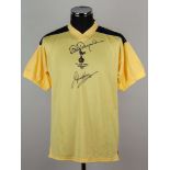 A yellow replica Tottenham Hotspur Steve Perryman and Glenn Hoddle autographed shirt &nbsp;