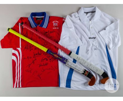 A red Atlanta 1996 Great Britain men's hockey team autographed polo shirt and two team signed hockey sticks, 1994 World Cup a