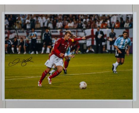 David Beckham colour photographic print, measuring 12 x 18 ins depicting the lead up to his goal against Argentina in 2002, s