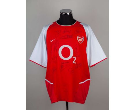 Red and white Arsenal autographed replica short-sleeved shirt, 2002-04, bearing twelve players autographs&nbsp;