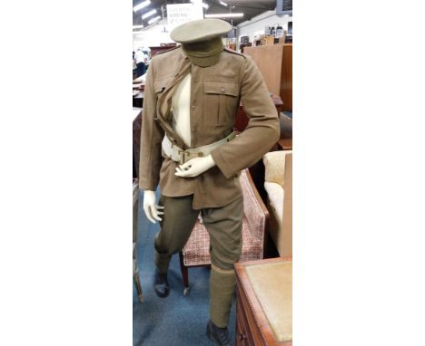A mannequin wearing British Army uniform, tunic dated 1961. 
