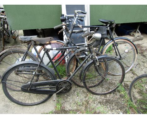 Three vintage bicycles. 