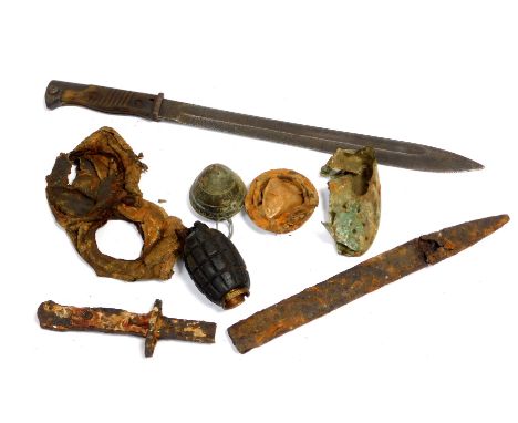 A First World War battlefield relics, to include German Butcher bayonet, and Mills grenade. 