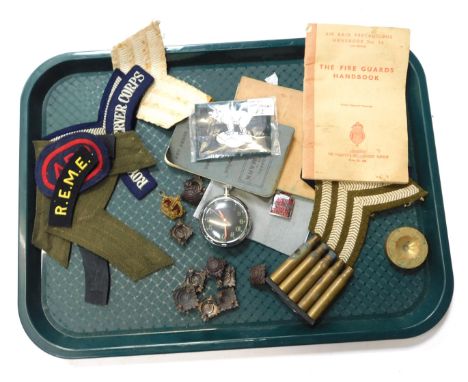 Various military badges, pips, First World War Bible, etc. 