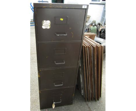 A vintage steel four drawer filing cabinet. 