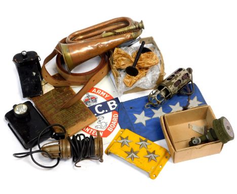 Various items of militaria, to include inspection lamps, bugle, military vehicles parts, etc. 