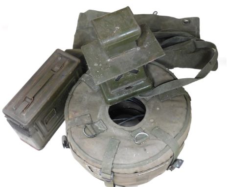 An American ammo tin, reel of military wire, kit bag, lamp, etc. 