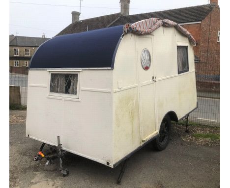 A vintage touring caravan.