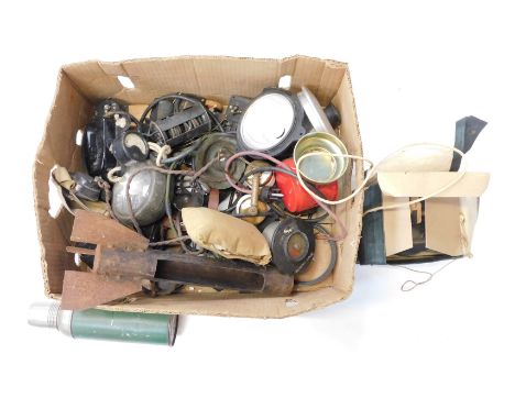 A box containing switches, gas mask, shell dressing, military headphone, lamp, etc. 