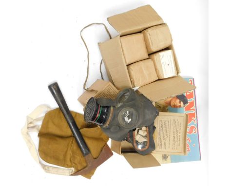 A World War II ARP gas masks, axe, bandages, etc. 