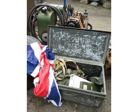 A steel military trunk, with sundry contents of old tools, lamps, Remploy individual protection kit, Union Jack, etc., the ti