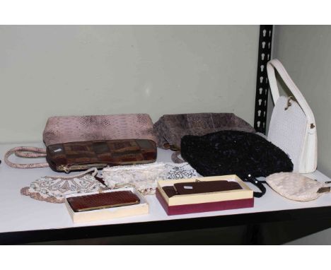 Eleven vintage handbags and purses including animal skin and beading.