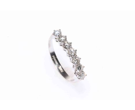 18 carat white gold seven stone diamond ring, size O, total diamond weight approximately 1.5 carats.