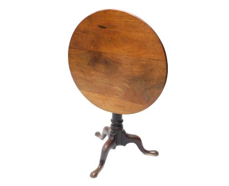 A 19thC tilt top tripod table, with circular top, gun barrel stem and triple cabriole legs, 70cm diameter. 