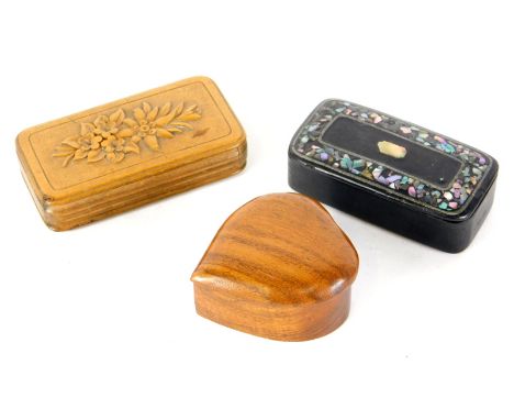 A late 19thC papier mache snuff box, another heavily carved with flowers, heart shaped box, and another circular, etc. (a qua