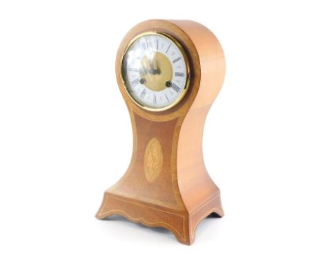 An Edwardian style Sheraton revival balloon mantel clock, with 11cm diameter Roman numeric dial with shell printed patera and
