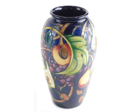 20thC Moorcroft pottery vase, impressed and printed marks beneath, 28cm high.