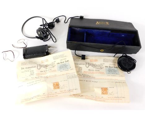 An Ardente R. H. Dent patent electric shock machine, partially cased, 27cm wide. 