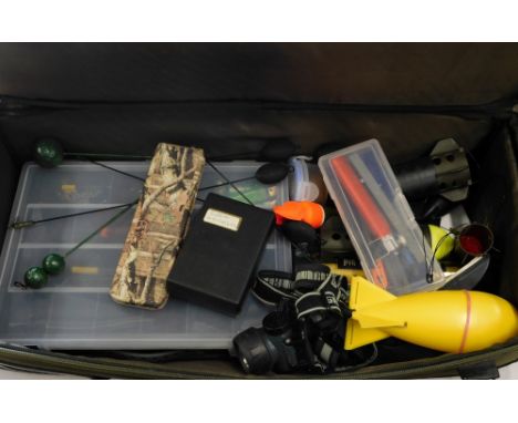 Various carp fishing accessories, including bobbin indicators, spods and spoms, etc.