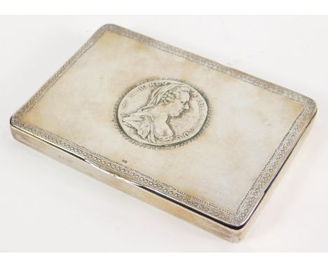 An early 20thC Continental silver coloured metal, silver snuff box, centred by a Maria Theresa Thaler coin, with an outer sta