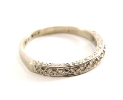 A white gold half eternity ring, set with small white stones, marked 18ct, 3g all in. 