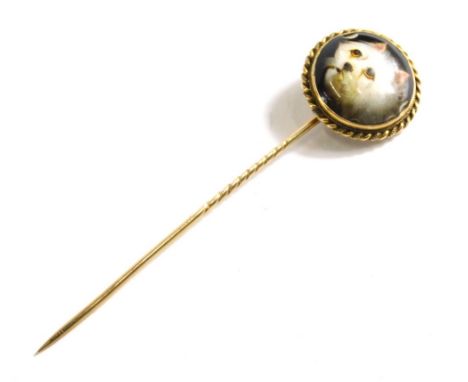 An early 20thC stick pin, with partial turned stem, the top with a porcelain enamelled plaque of a cat, 10cm high. (cased) 