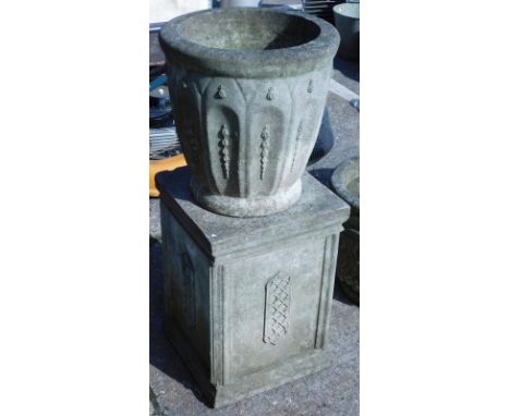 A classical style composite urn planter, with circular tapering planter, on rectangular base, 95cm high. 
