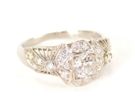 A ladies diamond cluster ring, c1920's with a central rose cut diamond, approximately 0.40ct, surrounded by 18 rose cut diamo