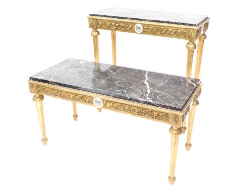 A French giltwood side table, with Limoges style medallion and scroll frieze, on turned tapering reeded legs, with sun patera