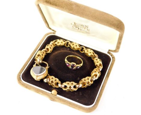 A Victorian two piece jewellery set, comprising fancy link bracelet with heart shaped clasp, 16cm long, and set with three pu