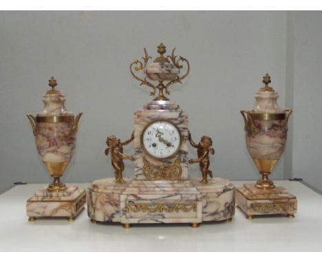 Late 19th century French marble clock garniture, gilt metal mounted, Arabic numerals and floral swag decoration to enamel dia