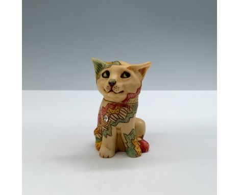 Charming Harmony Kingdom trinket box in the shape of a sitting cat, featuring a colorful patchwork design with intricate deta