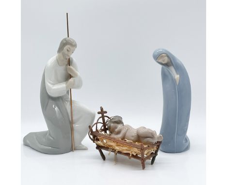 This elegant Lladro porcelain nativity set comprises three finely crafted figurines: Saint Joseph (#1000102.06), Madonna (#01