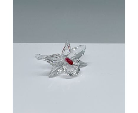 Swarovski crystal figurine, "The Orchid, Pink," featuring a beautifully crafted orchid flower with a vivid pink accent, measu