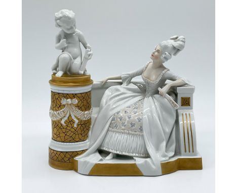 Elegant Rosenthal porcelain figurine depicting an 18th-century lady seated on a bench, attentively gazing at Cupid atop a gil