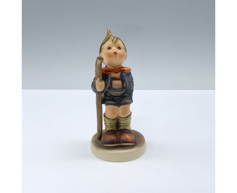 Young boy dressed for hiking, holding his walking stick. Goebel Hummel backstamp.Issued: 20th centuryDimensions: 2"W x 4.25"H