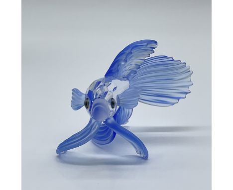 This retired Swarovski crystal blue Siamese fighting fish was part of the “South Sea” group. It has a clear crystal body, fro