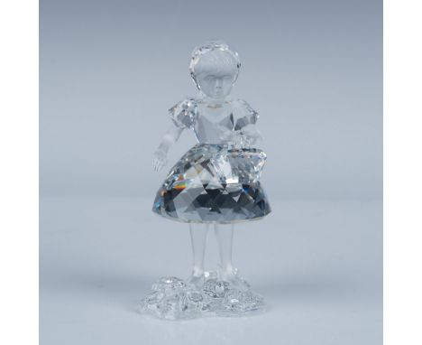 This enchanting Swarovski crystal figurine, "Red Riding Hood with Basket," was designed by Edith Mair and is a stunning repre