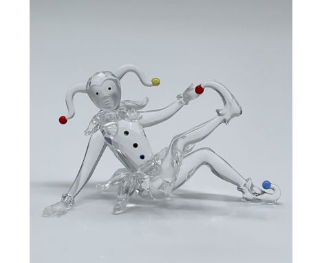 Presenting a delightful Swarovski Crystal Jester figurine, crafted with exceptional detail and precision. This playful piece 