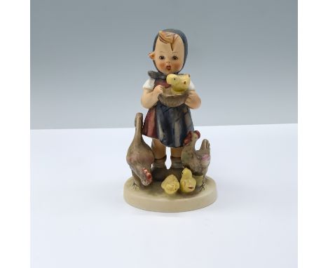Matte hand painted porcelain figurine featuring a young girl feeding a chicken family. Goebel TMK4. M.I. Hummel impressed. Go